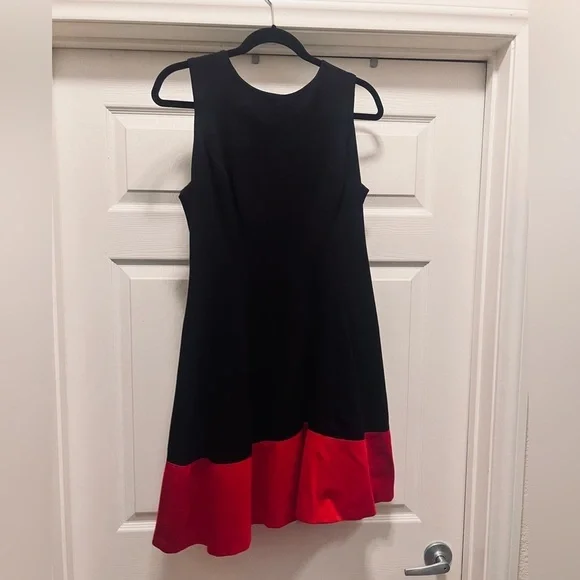 black and red peplum dress Ansley Two Tone Peplum Dress in Classic Black/Wine Red